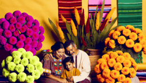 alt_text: "Celebrating Mexican Mother’s Day with a loving mother, children, marigolds, and vibrant decor."
